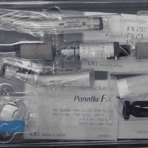 NSK STUDENT KIT Close-up of packaged NSK PanAir FX dental student kit, featuring contra angle and turbine handpieces Made in Japan
